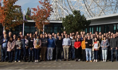 Row of Jodrell Bank staff stood in a line 