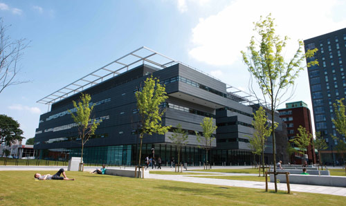 Alan Turing Building viewed from the lawn outside