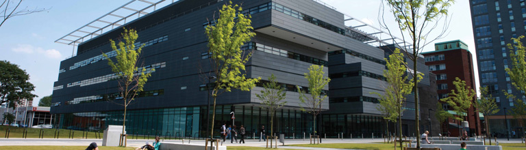 Alan Turing Building viewed from the lawn outside