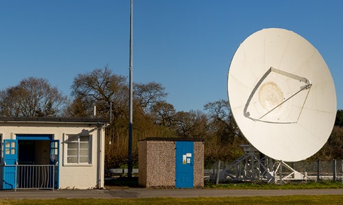 telescope next to outbuildings 